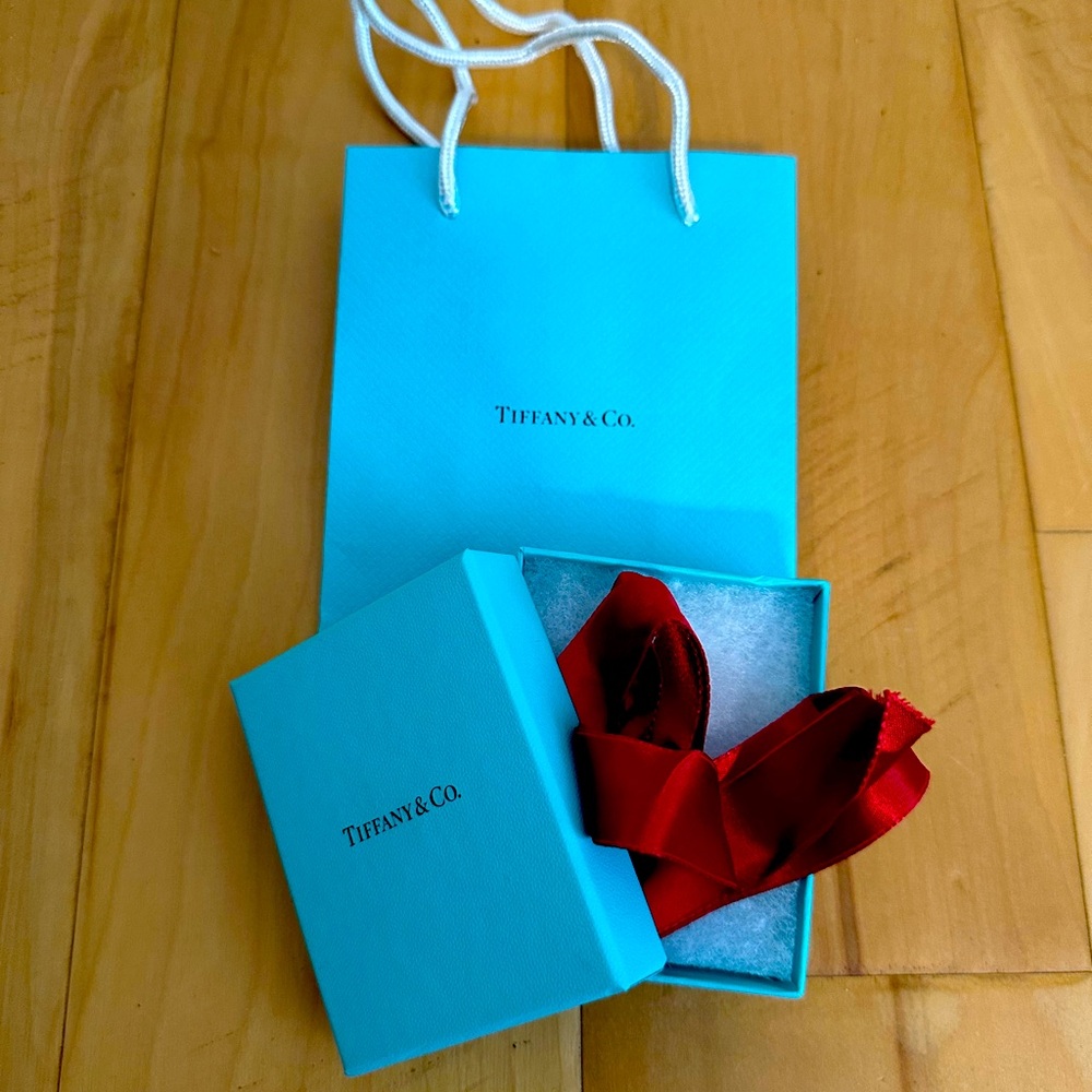 Tiffany & Co. a gift box, ribbon and a bag